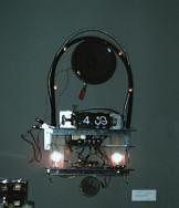 atomic clock &copy 1999 cristin pescosolido